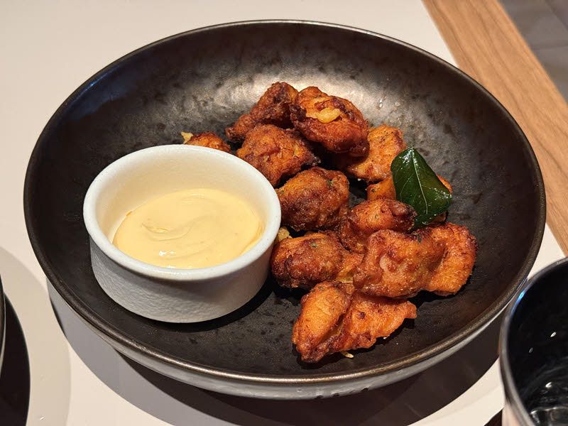 Chicken 65 - crispy fried chicken bites, curry leaf, habanero aioli